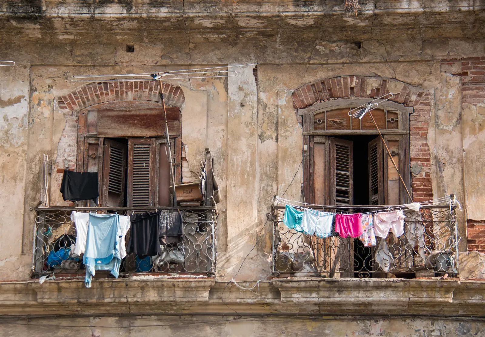 Balconies of homes on a street in Havana