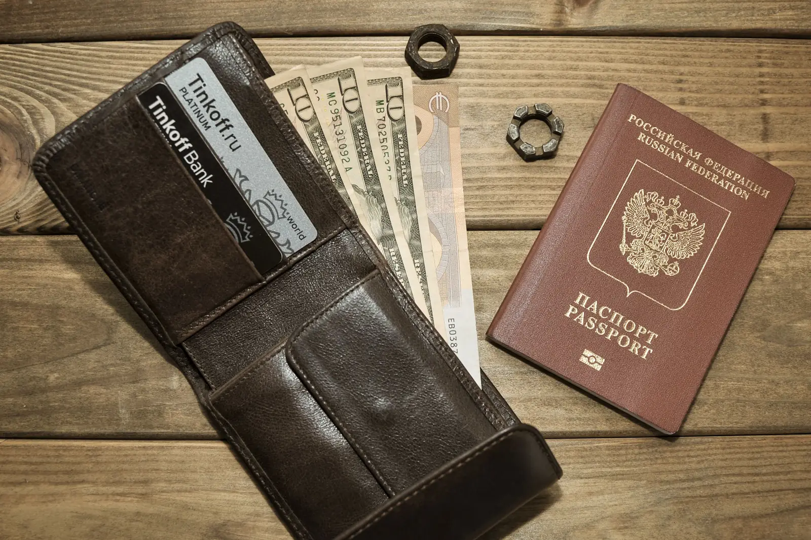 Travel wallet with banknotes, cards and a passport