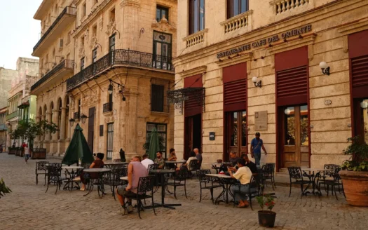 Cafeteria with outdoor tables on a street in central Havana